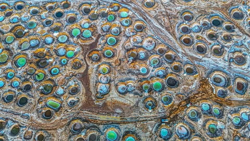 Aerial view of geothermal hot springs and mineral pools near Lac Assal